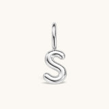 Nadare Co. silver bubble initial charm in the shape of the letter S with a rounded, puffed design.