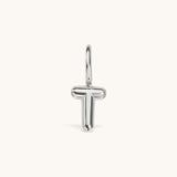 Nadare Co. silver-toned bubble initial charm in the shape of the letter T with a smooth, puffed design.
