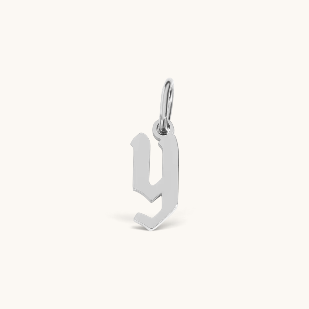 Nadare Co. silver-toned gothic letter Y charm pendant with sharp edges for a necklace stack.