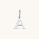 Nadare Co. silver-toned stainless steel letter A initial charm with a classic serif font design.
