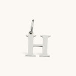Nadare Co. silver-tone stainless steel initial H charm with a classic serif font design