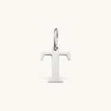 Nadare Co. silver-toned letter T initial charm with a clean serif font design for necklace layering.