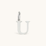 Nadare Co. silver-tone stainless steel letter U initial charm with a classic serif font design.