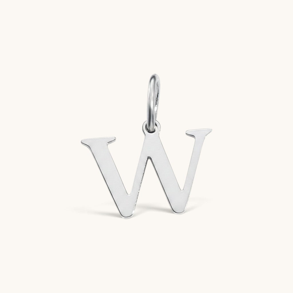 Nadare Co. silver-tone initial W charm with a clean serif font design for everyday jewelry layering.