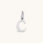 Nadare Co. silver-tone lowercase letter C charm made from durable stainless steel for everyday jewelry layering.