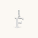 Nadare Co. silver-toned stainless steel letter F initial charm with a classic serif font design.