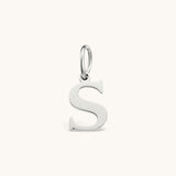 Nadare Co. silver-toned stainless steel letter S initial charm with a classic serif font design.
