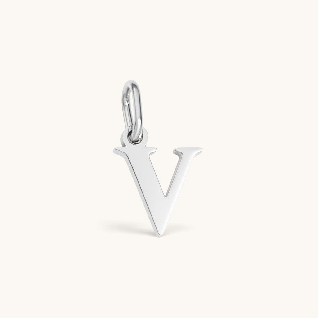 Nadare Co. silver-toned stainless steel lowercase letter V initial charm pendant for everyday jewelry layering