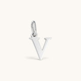 Nadare Co. silver-toned stainless steel lowercase letter V initial charm pendant for everyday jewelry layering