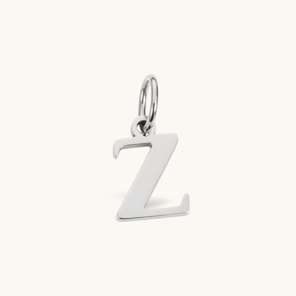 Nadare Co. silver-tone lowercase letter Z initial charm pendant made from durable stainless steel.