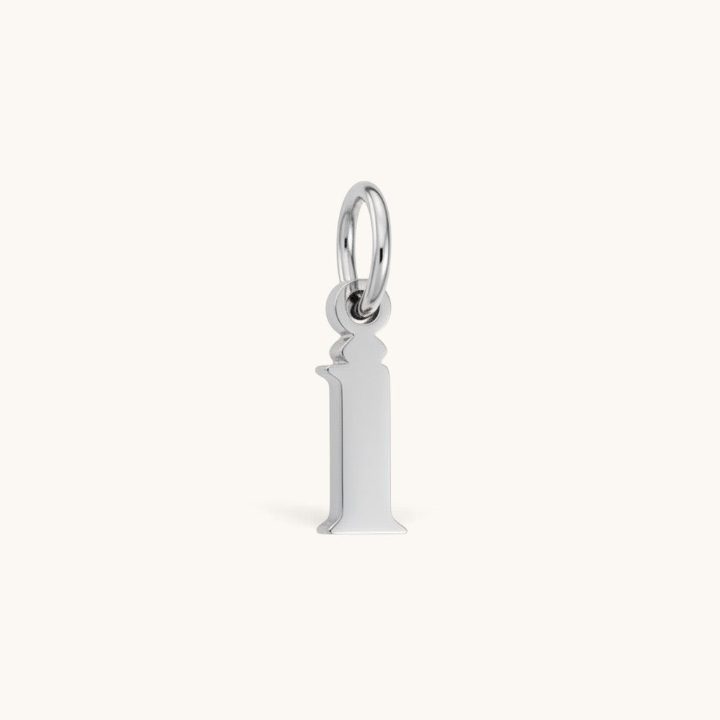 Nadare Co. silver-toned stainless steel lowercase letter i charm for everyday jewelry layering