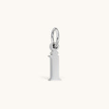 Nadare Co. silver-toned stainless steel lowercase letter i charm for everyday jewelry layering