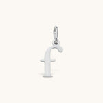 Nadare Co. silver-toned lowercase letter f charm made from stainless steel for everyday jewelry layering.