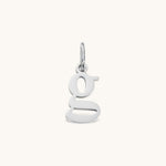 Nadare Co. silver lowercase letter g charm made from durable stainless steel for everyday jewelry layering