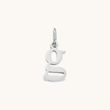 Nadare Co. silver lowercase letter g charm made from durable stainless steel for everyday jewelry layering