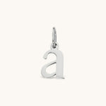 Nadare Co. silver-toned lowercase letter a charm made of stainless steel for everyday jewelry layering.