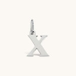 Nadare Co. silver-toned lowercase letter X charm pendant for everyday jewelry layering