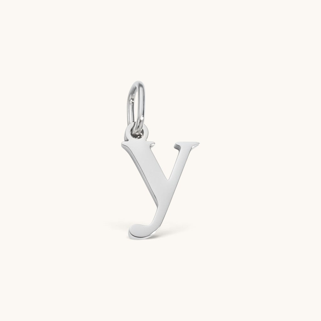 Nadare Co. silver lowercase letter Y initial charm made from durable stainless steel for everyday layering.