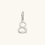 Nadare Co. silver-toned number 8 charm made from stainless steel for minimal everyday jewelry layering.