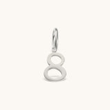 Nadare Co. silver-toned number 8 charm made from stainless steel for minimal everyday jewelry layering.