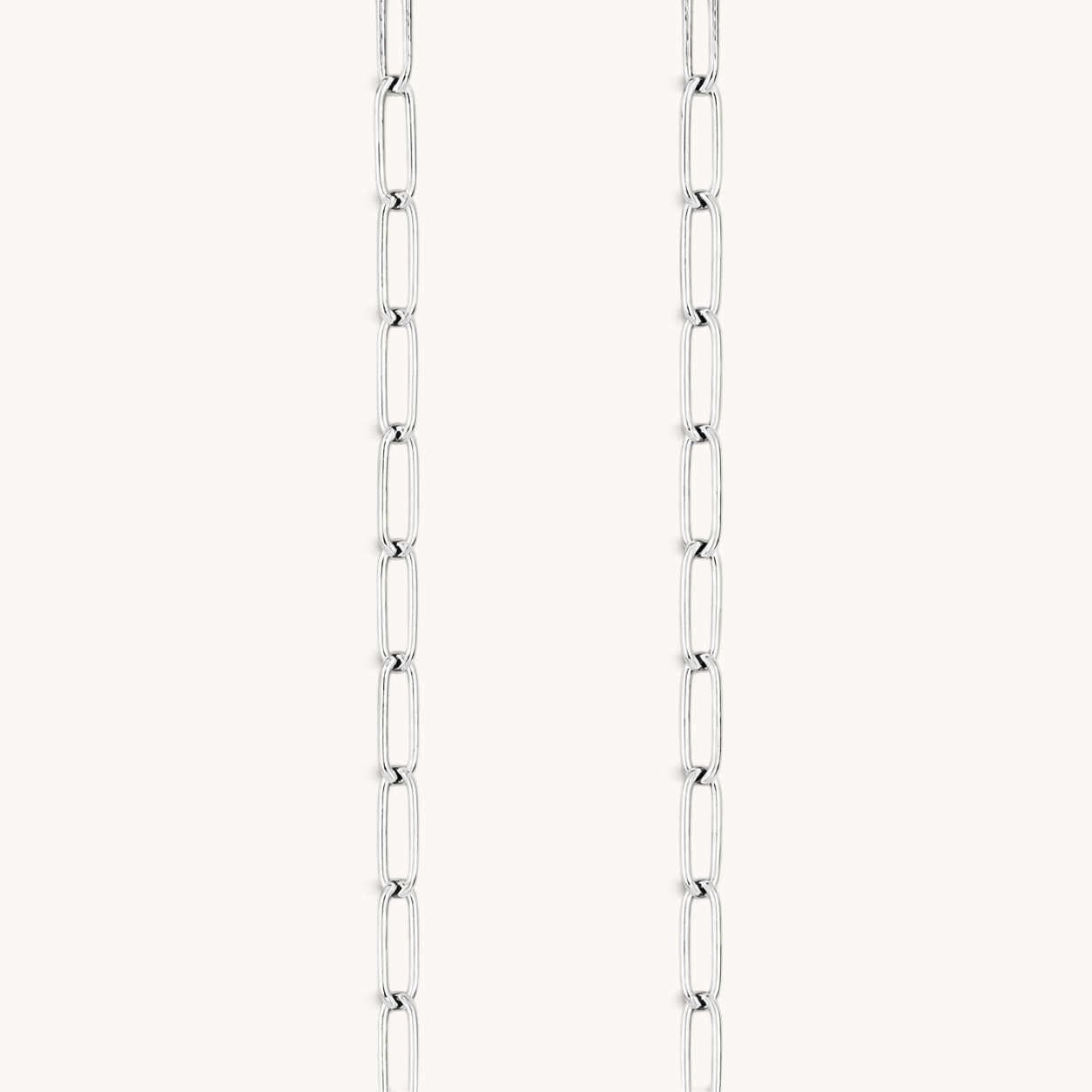 Nadare Co. silver oval switch chain necklace featuring durable tarnish-resistant stainless steel links