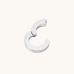 Nadare Co. silver circular switch clasp for charm necklaces, designed to hold up to three charms.