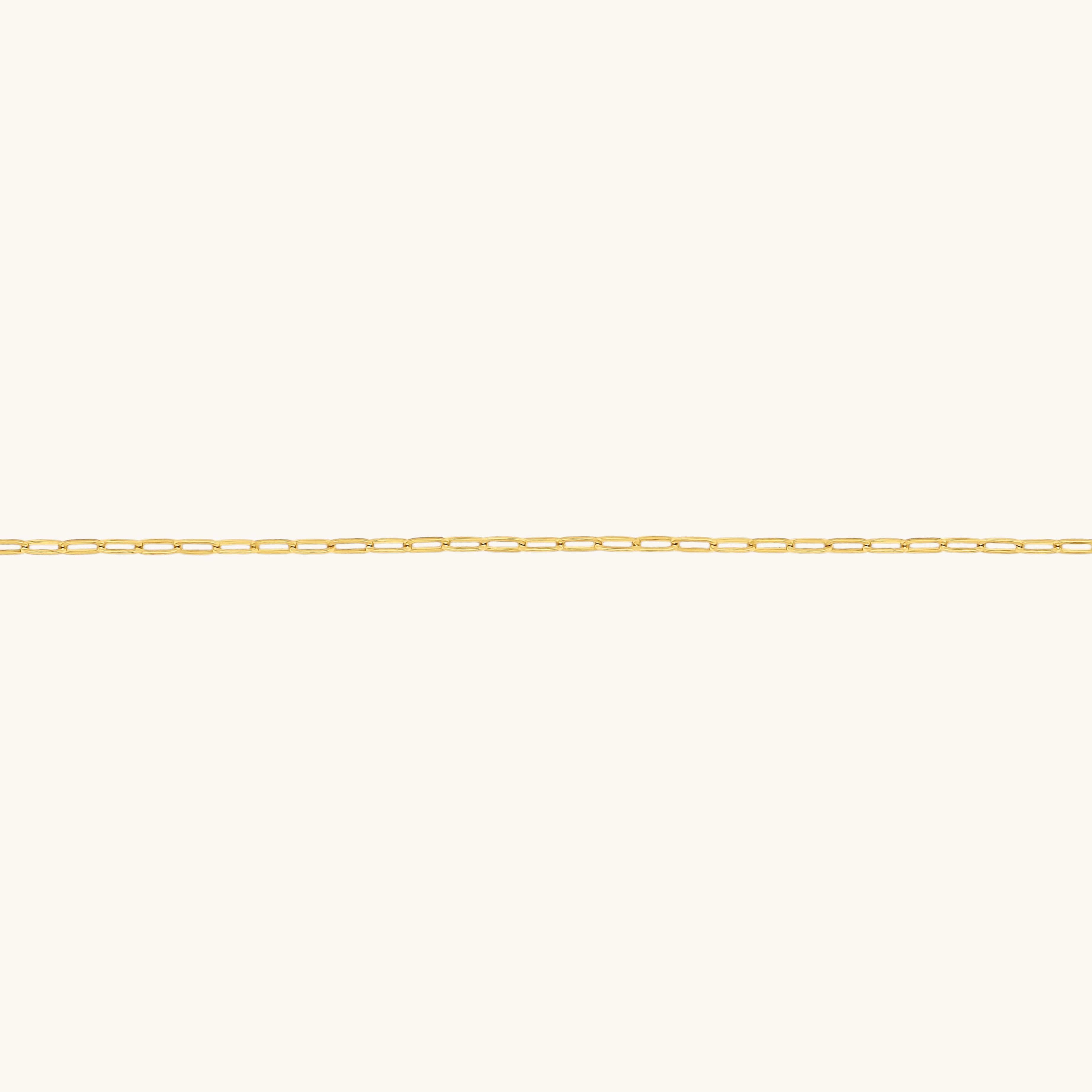 Nadare Co. 14k gold plated stainless steel small oval switch chain necklace for everyday wear.