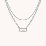 Nadare Co. Sylvie silver layered necklace with a delicate chain, curb chain, and functional carabiner clasp.