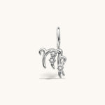 Nadare Co. silver-toned Virgo zodiac charm pendant with sparkling cubic zirconia accents for necklace layering