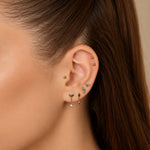 Nadare Co. Willow threadless earring featuring emerald green marquise CZ stones and a delicate gold chain drop.